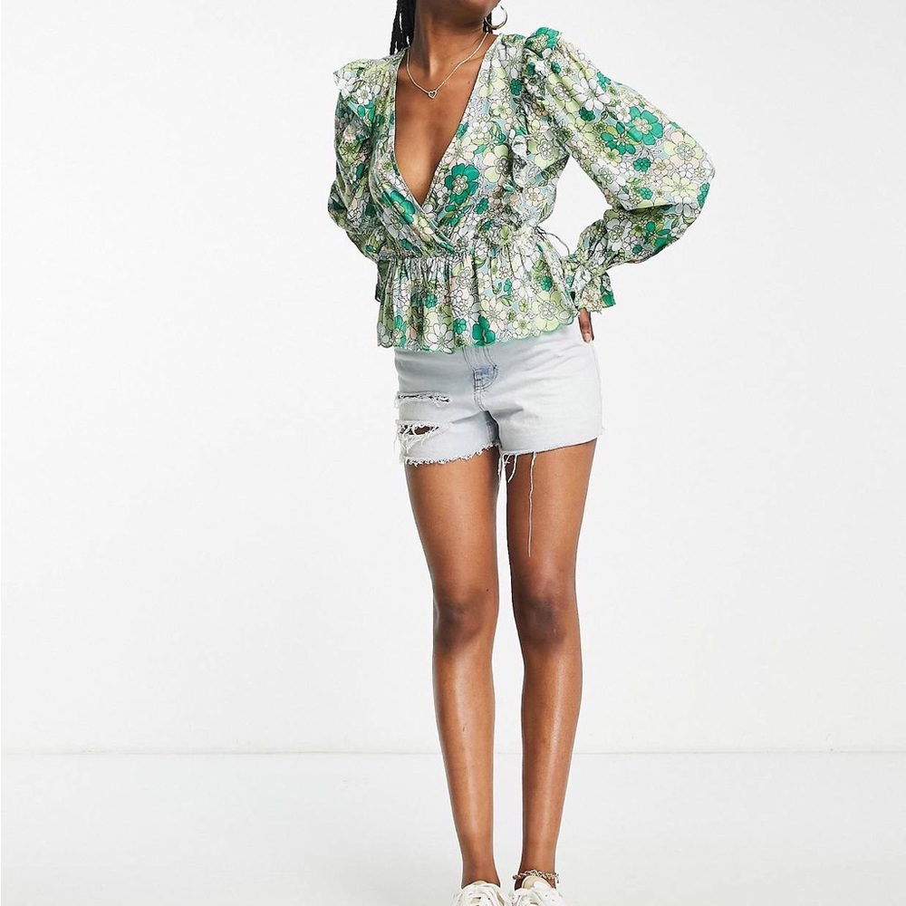 ASOS design wrap top with scallop peplum hem in green